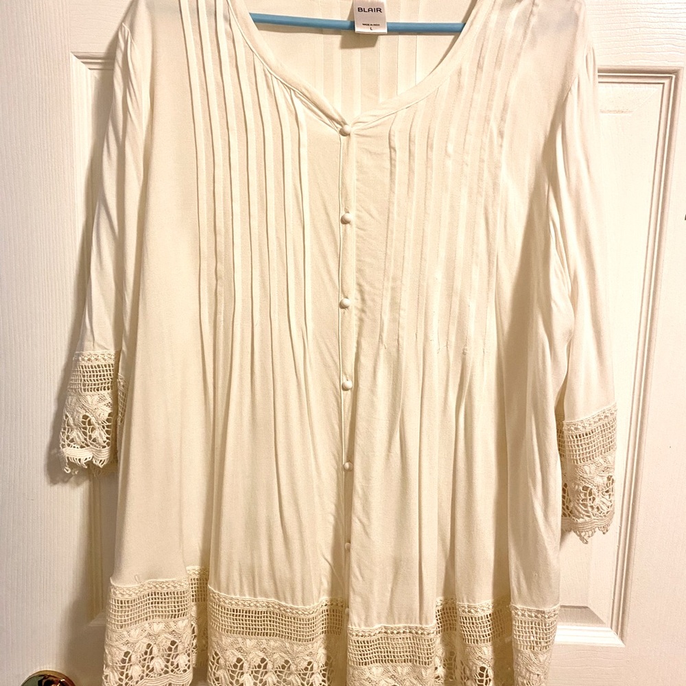 cream colored blouse